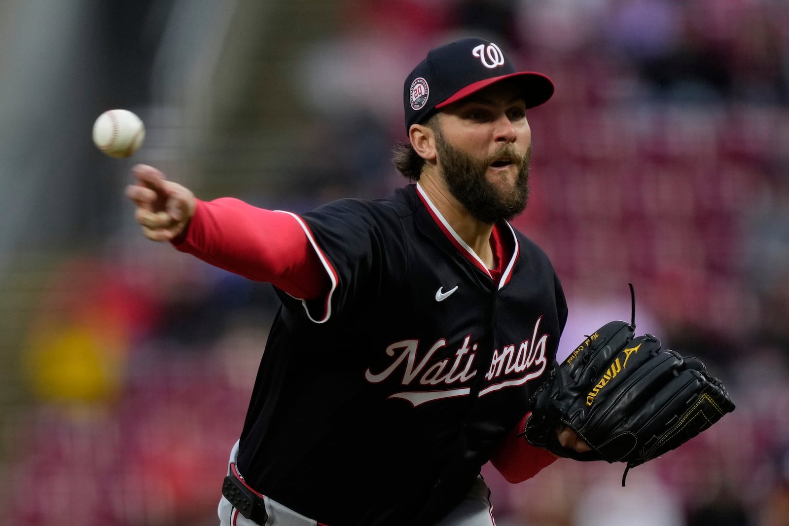 Washington Nationals pitcher Trevor Williams throws during the first inning of a baseball game against the Cincinnati Reds, Saturday, May 3, 2025, in Cincinnati. (AP Photo/Carolyn Kaster)