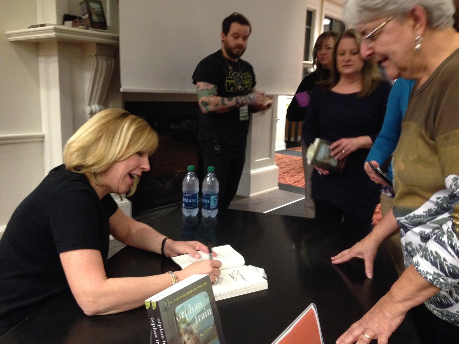 Author Christina Baker Kline signs books at the kickoff of The Big Read at Books & Co. at The Greene.  Photo by Meredith Moss