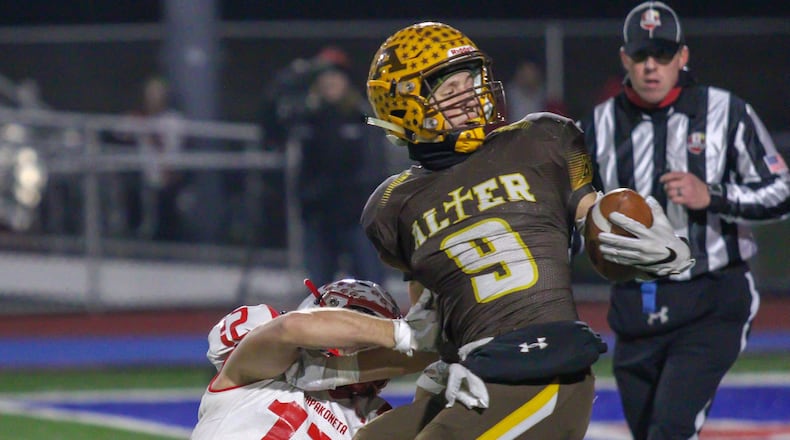Alter’s Derek Willits stretches short of the goal line during the Knights’ 21-7 victory over Wapakoneta in the Division III, Region 12 championship game at Piqua High School’s Alexander Stadium on Friday, Nov. 16, 2018. CONTRIBUTED PHOTO BY MICHAEL COOPER