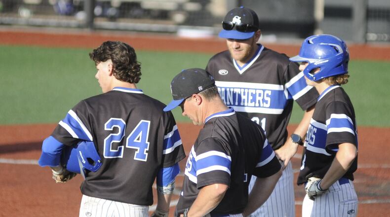 Springboro baseball coach Mark Pelfrey (near) has made all the right moves during the Panthers’ postseason run to the D-I state final four. With Pelfrey at UC’s Marge Schott Stadium are Ben Barber (24) assistant coach David Riley and Adam Schomburg during a 4-3 regional semifinal final defeat of Cin. Elder on Thursday, May 23, 2019. MARC PENDLETON / STAFF
