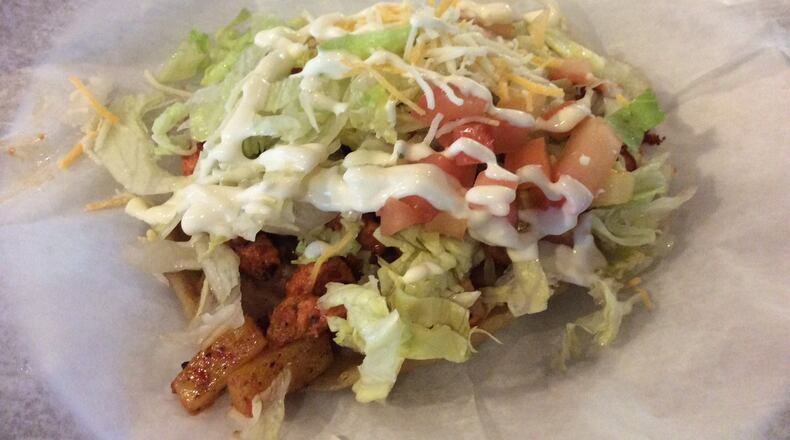 Huarache with al pastor (seasoned pork) served at Chiapas Mexican Grill. MARK FISHER/STAFF