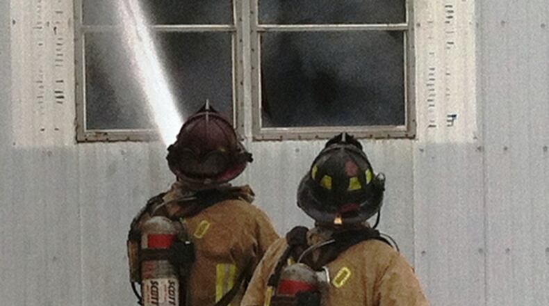 Fire crews from several jurisdictions responded to a report of a fire at a mobile home on East Kitridge Road on Tuesday afternoon, Feb. 5, 2013. (Sean Dunster/Staff)