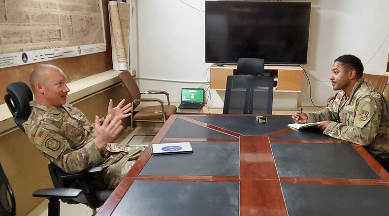 Senior Master Sgt. Benjamin Seekell discusses mentoring and career development with Tech. Sgt. Kenneth Jones recently from a deployed location in Iraq. Seekell was named 2020 First Sergeant of the Year by the 88th Air Base Wing and Air Force Life Cycle Management Center for his work in the 88th Medical Group. CONTRIBUTED PHOTO