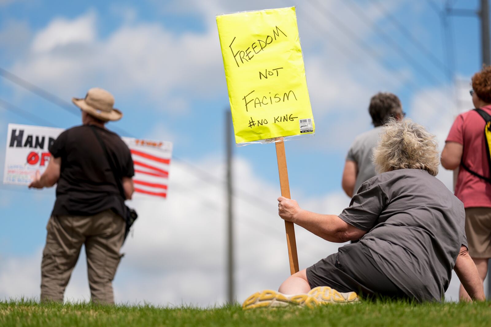 Beth Maddox, of Calhoun, Ga., right, participates in a civil rights demonstrators, Saturday, April 5, 2025, in Rome, Ga. (AP Photo/Mike Stewart)