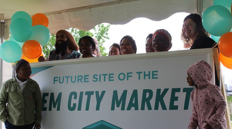 Supporters of the Gem City Market at the proposed site of the grocery store on the 300-400 blocks of Salem Avenue. CORNELIUS FROLIK / STAFF