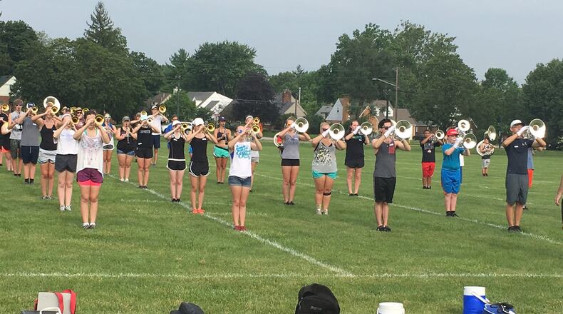 Fairmont High School band members participate in a summer practice on the fields outside the school, preparing for their fall competition season. JEREMY P. KELLEY / STAFF