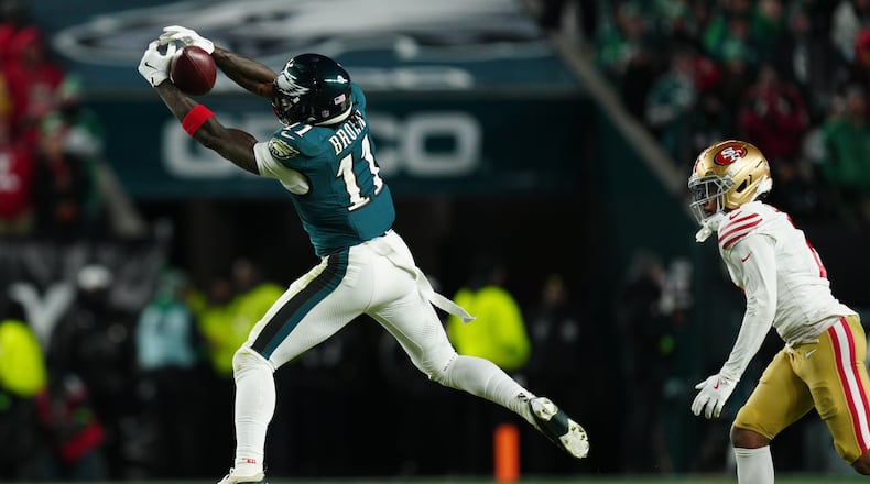 Philadelphia Eagles wide receiver A.J. Brown (11) catch make the catch during the second half of an NFL wild-card playoff football game against the San Francisco 49ers on Sunday, Jan. 11, 2026, in Philadelphia. (AP Photo/Derik Hamilton)