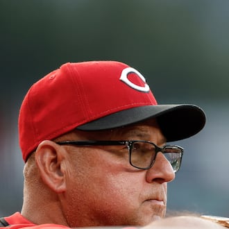 Cincinnati Reds manager Terry Francona looks on from the dugout during the second inning of a baseball game against the Washington Nationals in Washington, Tuesday, July 22, 2025. (AP Photo/Terrance Williams)