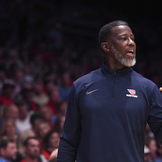 Dayton's Anthony Grant coaches during a game against Liberty on Saturday, Dec. 20, 2025, at UD Arena. David Jablonski/Staff