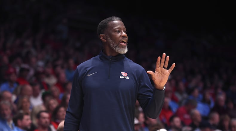 Dayton's Anthony Grant coaches during a game against Liberty on Saturday, Dec. 20, 2025, at UD Arena. David Jablonski/Staff