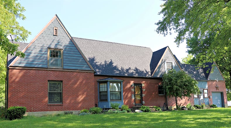 The property has a brick residence with 3,480 sq. ft. of living space. The 56.12 acres is divided by Preble Country’s Bantas Creek with a 25-acre leased tillage field, thick woods with walking paths and fishing options, tailored lawn with five additional out-buildings all nestled well off the roadway at the end of a gravel drive. CONTRIBUTED PHOTO BY KATHY TYLER