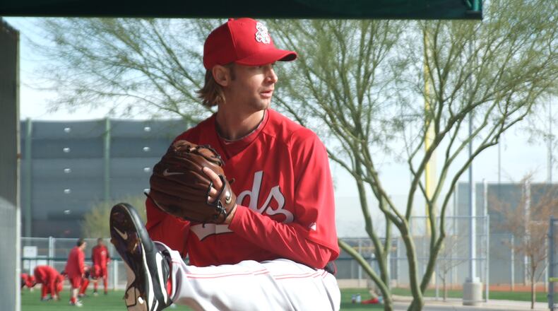 The classic high leg kick of Bronson Arroyo at Reds training camp in Goodyear, Arizona.