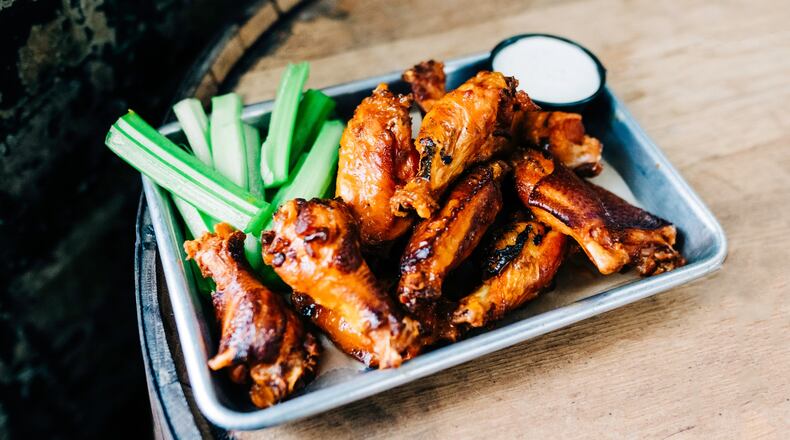 As the Rose Music Center at The Heights kicks off its concert season this week, Warped Wing is launching a concert night food menu at its brewery and smokery. Pictured are the smoked wings (CONTRIBUTED PHOTO).