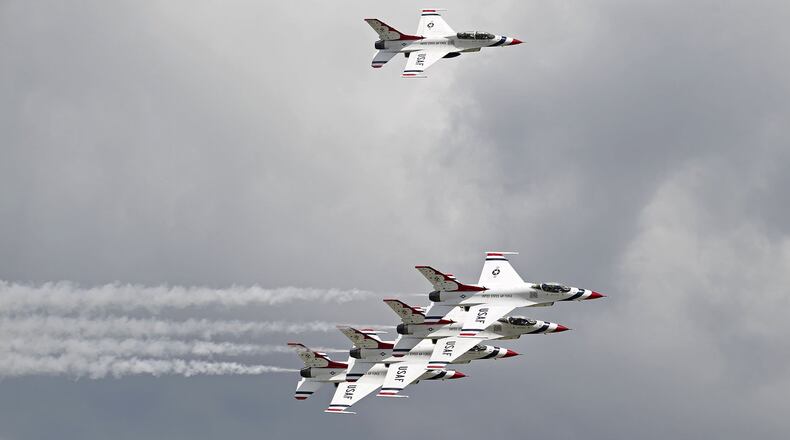 Thunderbird 7, top, acts as chase plane for the echelon formation. The U.S. Air Force Thunderbirds arrived at the Dayton International Airport on Monday in preparation for the upcoming Vectren Dayton Air Show. TY GREENLEES / STAFF
