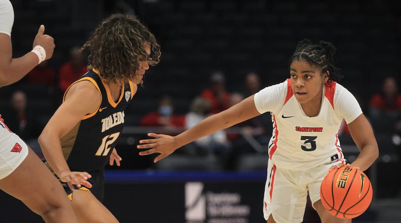 Dayton's Makira Cook dribbles against Toledo on Wednesday, Nov. 17, 2021, at UD Arena. David Jablonski/Staff