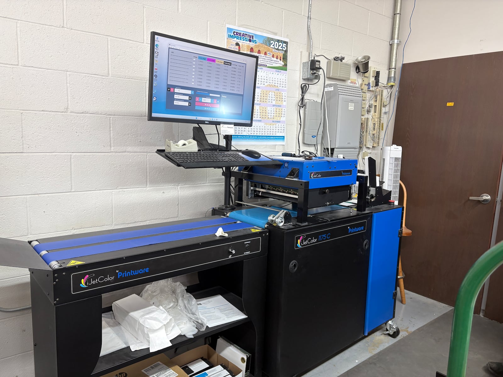 The most recent investment at Creative Impressions is a state-of-the-art digital envelope press that prints 10,000 full color and full bleed envelopes an hour. JEN BALDUF/STAFF