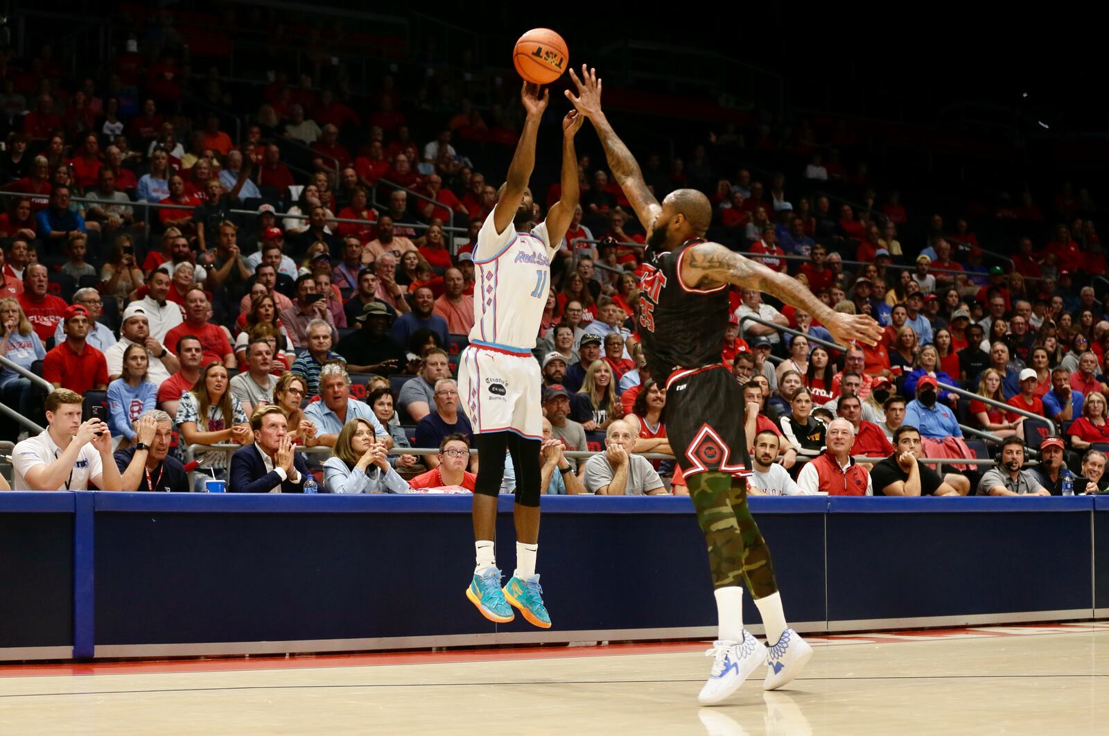 The Red Scare's Scoochie Smith makes a 3-pointer against The Money Team on Wednesday, July 27, in the third round of The Basketball Tournament at UD Arena in Dayton. David Jablonski/Staff