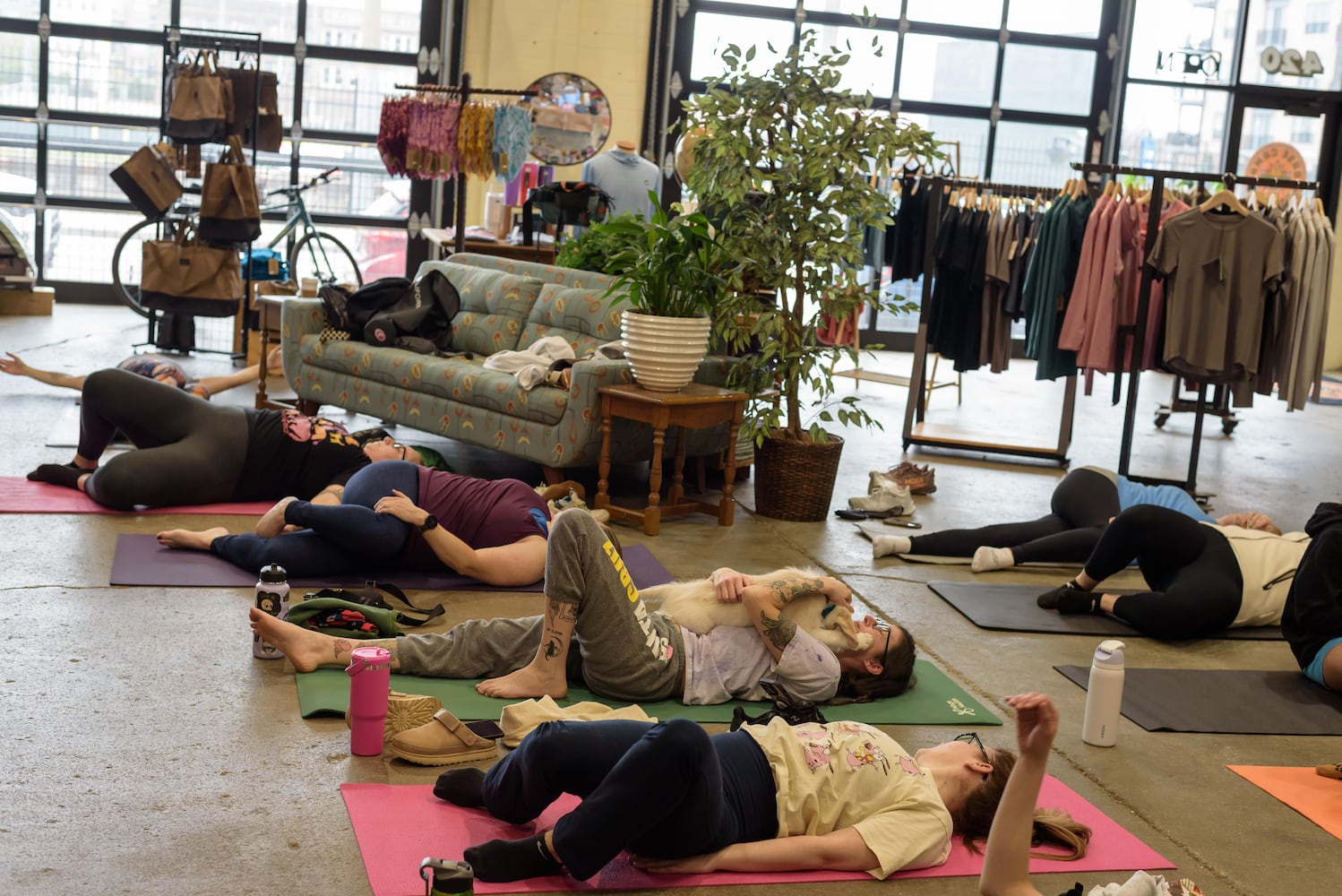 PHOTOS: Puppy Yoga with Adopt a Pit at Base Camp Outdoors Co. in downtown Dayton