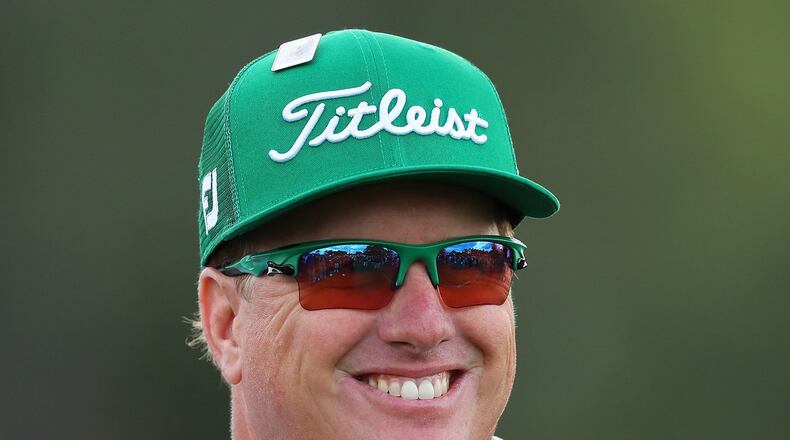 Walking off the 18th green with a four-shot, first-round Masters lead is ample reason to smile, as Charley Hoffman will attest. (Curtis Compton/ccompton@ajc.com)
