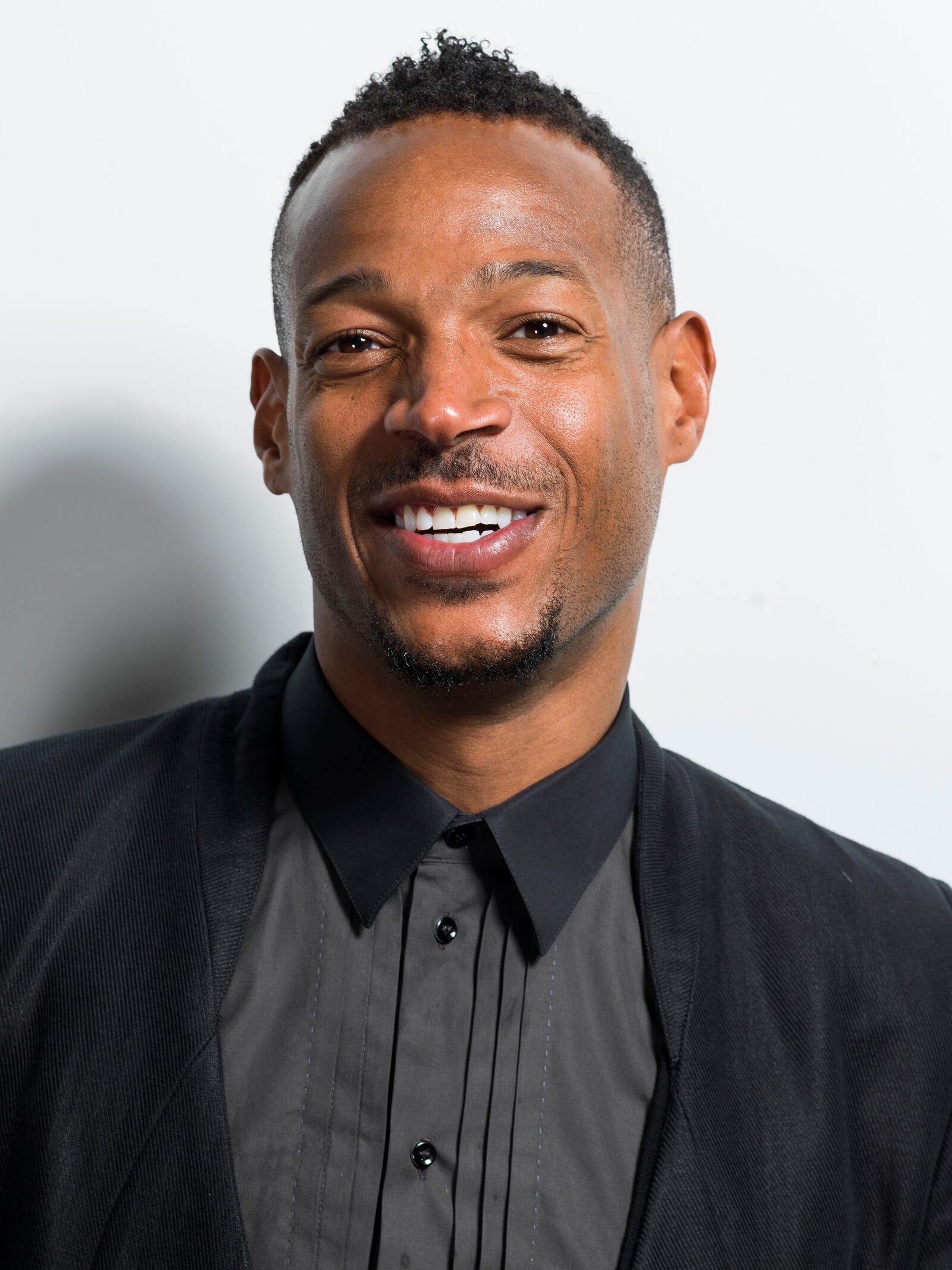American actor and star in the NBC network comedy series "I Can Do That" Marlon Wayans poses for a portrait on Thursday, June 4, 2015, in New York. What do you get when you take one of the years biggest box office hits - Fifty Shades of Grey - and turn it over to funny man Wayans? Christian Grey is turning into Christian Black in Wayans spoof of the film Fifty Shades of Black, which has been picked up by Open Road Films for release next January. (Photo by Scott Gries/Invision/AP)