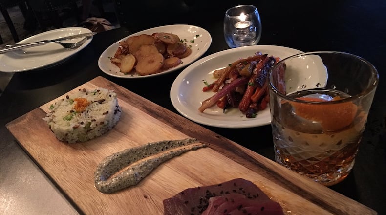 The ahi tuna entree with an old fashioned and sides of potatoes and carrots. CONTRIBUTED PHOTO BY ALEXIS LARSEN