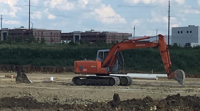 A new Austin Business Park building in Miamisburg will be the next home of Winter Guard International, officials said recently. The organization, which hosts world events in the Dayton region, will occupy about 20 percent of the 60,000 square foot facility. It will be located near the Interstate 75/Austin Boulevard interchange. Buildings in the background include United Grindings North America headquarters (white) and offices at Austin Landing. NICK BLIZZARD/STAFF
