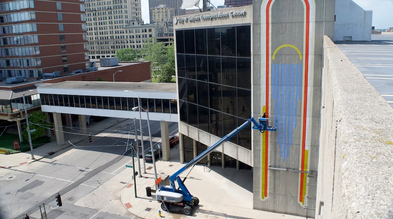 A new artwork, created by artist Atalie Gagnet, has been completed on the Dayton Transportation Center garage. CHEYANNE LUMPKIN / CONTRIBUTED PHOTO