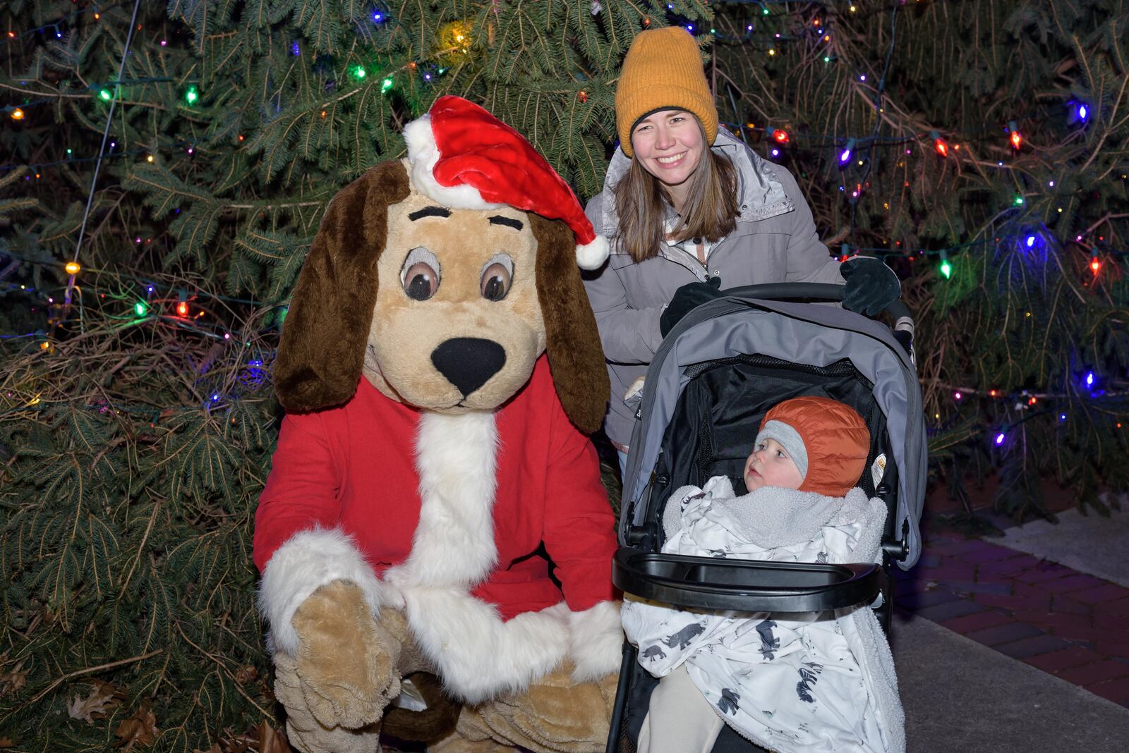 The Kettering Mayor’s Tree Lighting kicked off the city’s holiday season on Friday, Dec. 6, 2024, at Lincoln Park Civic Commons. Activities included Mayor Peggy Lehner’s Christmas tree lighting ceremony, photos with Santa Paws, caroling by the Kettering Children’s Choir, horse-drawn carriage rides plus cookies and cocoa. TOM GILLIAM / CONTRIBUTING PHOTOGRAPHER