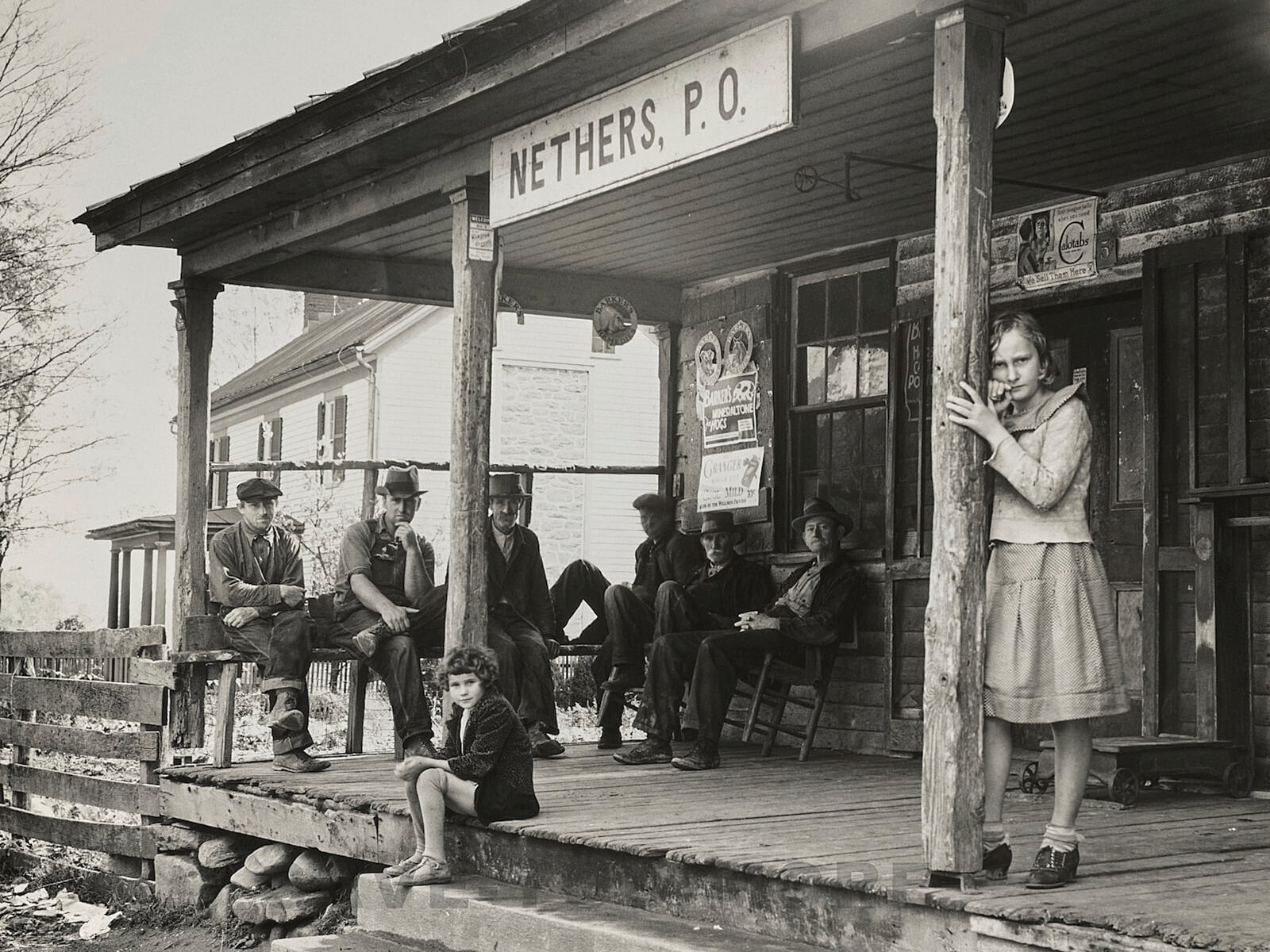 This photo provided by the Library of Congress shows people at the Nethers, Va., post office in Oct. 1935, during the Great Depression. (Arthur Rothstein/Farm Security Administration/Library of Congress via AP)