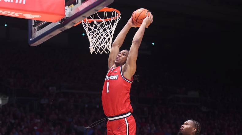 Dayton's Malcolm Thomas dunks against Virginia Commonwealth on Friday, March 6, 2026, at UD Arena. David Jablonski/Staff