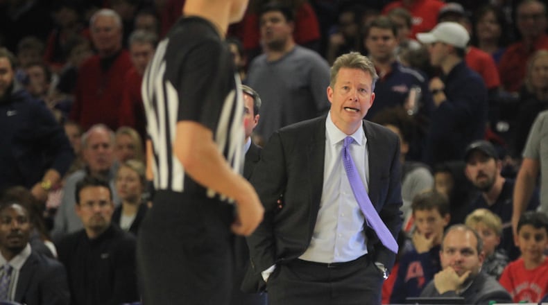 Richmond coach Chris Mooney coaches during a game against Dayton on Saturday, Jan. 25, 2020, at the Robins Center in Richmond, Va.