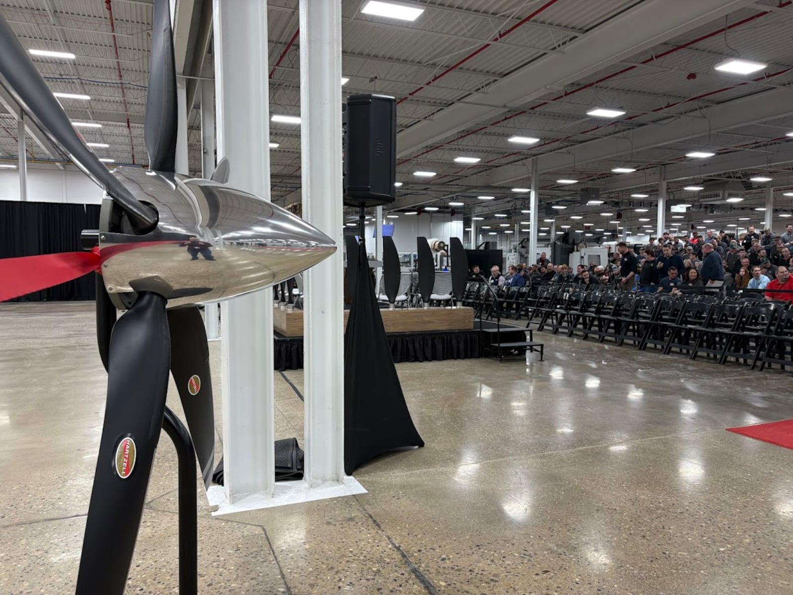 Employers gather to celebrate Hartzell Propeller's new Propeller Innovation Center in Piqua on Friday, Feb. 20, 2026. THOMAS GNAU/STAFF