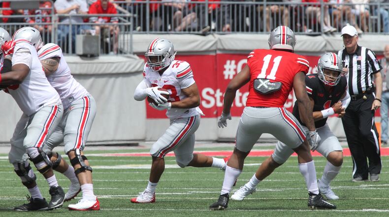 Marcus Teague runs the ball in the Ohio State spring game on Saturday, April 13, 2019, at Ohio Stadium in Columbus. David Jablonski/Staff