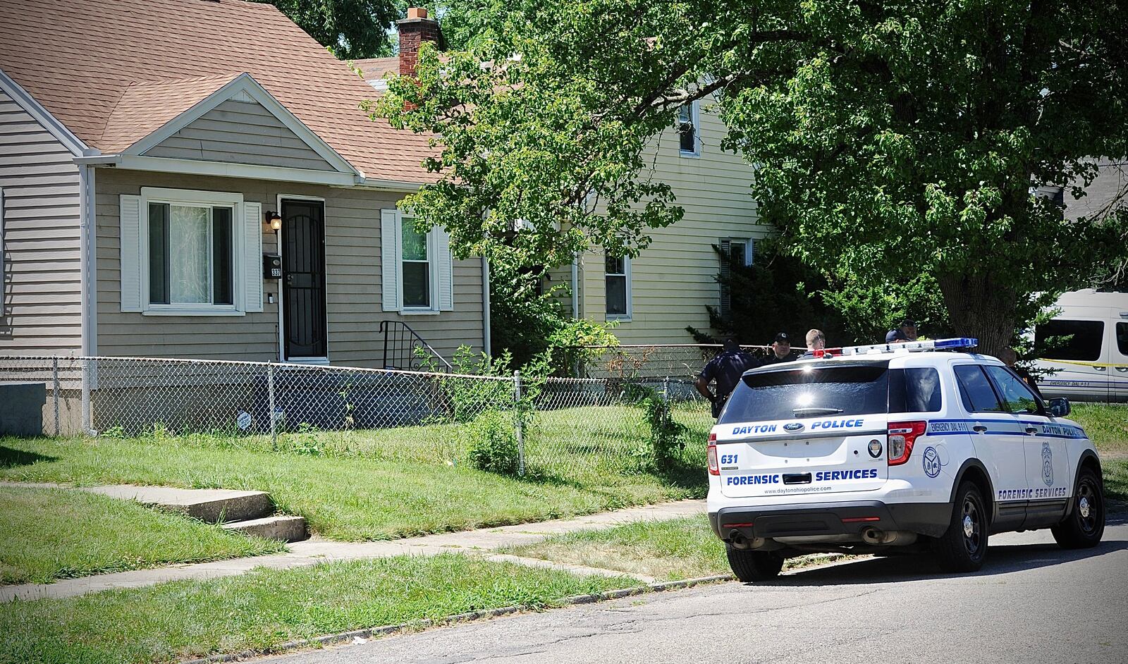 The bodies of a woman and girl were found Thursday, June 23, 2022, inside a house in the 300 block of Burleigh Avenue in Dayton. MARSHALL GORBY/STAFF