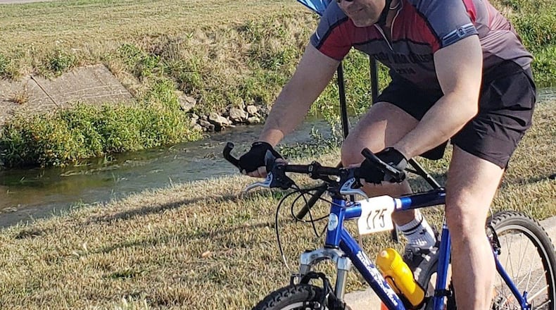 Col. Thomas Sherman, 88th Air Base Wing and installation commander, who rode Blue Streak Time Trial for the first time, starts out on the 10-mile course around Wright-Patterson Air Force Base’s Area A flight line Sept. 10 with the evening’s temperatures near 90 degrees. (Contributed photo/Chuck Smith)