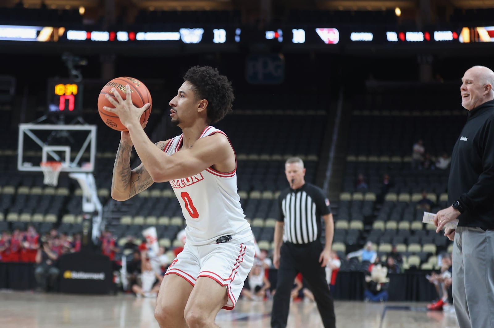 Dayton's Javon Bennett prepares to shoot a 3-pointer in the first half against St. Bonaventure in the quarterfinals of the Atlantic 10 Conference tournament on Friday, March 13, 2026, at PPG Paints Arena in Pittsburgh. David Jablonski/Staff