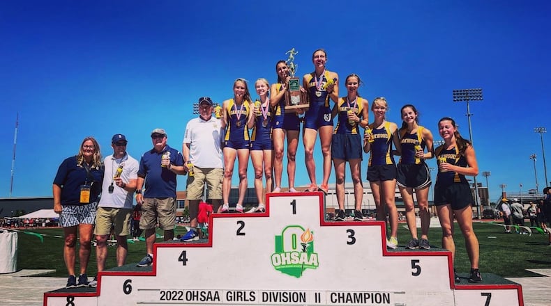 The Oakwood girls track team celebrates a Division II state track championship on June 4, 2022, at Jesse Owens Memorial Stadium in Columbus. David Jablonski/Staff