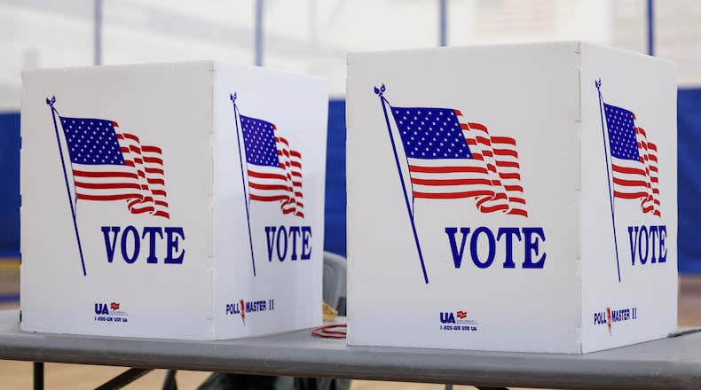 Voter privacy kiosks at Dunbar High School. BRYANT BILLING / STAFF