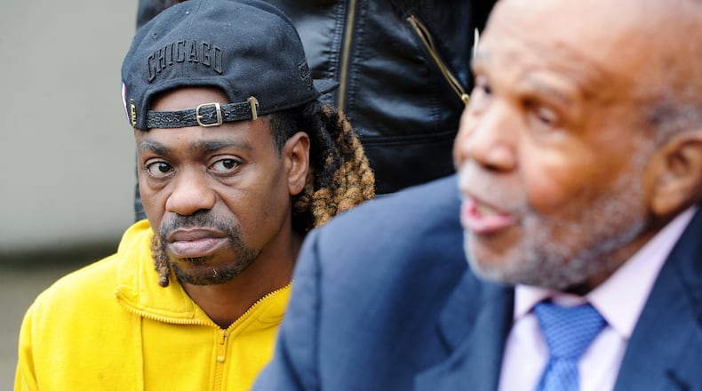 Clifford Owensby, left, listens to his attorney James Willis after court Monday, Oct. 25, 2021 about the minor traffic misdemeanors of September 30. Owensby was charged for a window tint and seat belt violation. He was found guilty of both traffic violations and fined $150 for each. MARSHALL GORBY\STAFF