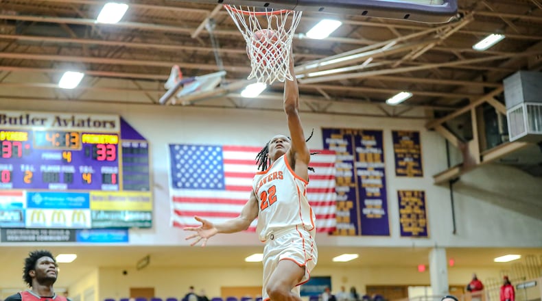 Beavercreek High School senior Isaiah-Michael Williams drives to the hoop during their game against Princeton on Saturday afternoon at the Vandalia Butler Student Activities Center. MICHAEL COOPER/STAFF