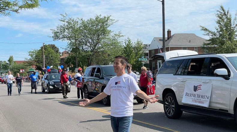 Cleveland businessman Bernie Moreno announced on Thursday Feb. 4, 2022 that he is dropping his Republican primary bid for the U.S. Senate seat now held by U.S. Sen. Rob Portman, R-Ohio. He's pictured here walking in the July 4 parade in Parma, Ohio. PROVIDED/BERNIE MORENO CAMPAIGN