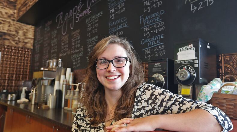 Michelle Hinojosa and her husband are the new owners of Agape’ Bookstore and Coffee Shoppe in the Park Shopping Center. BILL LACKEY/STAFF