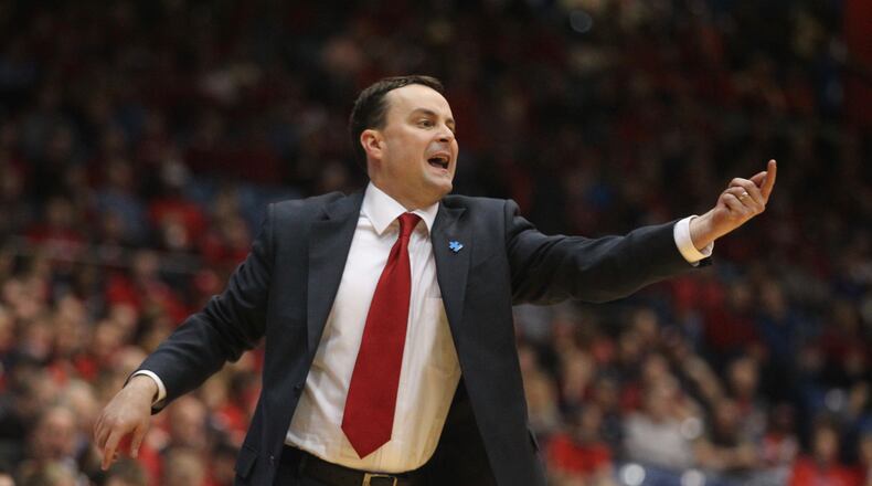 Archie Miller yells to his players during a game against Duquesne. David Jablonski/Staff