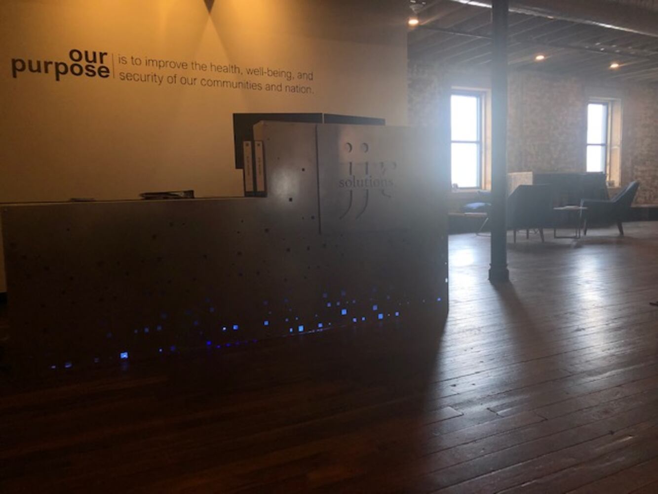 PHOTOS: Inside the new downtown Dayton office that has an industrial slide