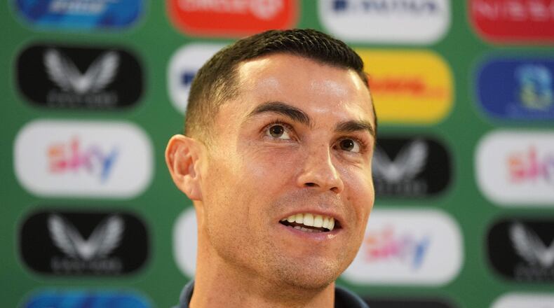Portugal's Cristiano Ronaldo speaks during a press conference in Dublin, Ireland, Wednesday Nov. 12, 2025, ahead of Thursday's World Cup qualifying soccer match against Ireland. (Brian Lawless/PA via AP)