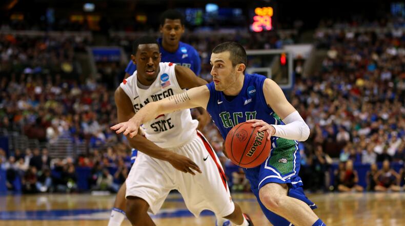 PHILADELPHIA, PA - MARCH 24:  Brett Comer #0 of the Florida Gulf Coast Eagles drives on Xavier Thames #2 of the San Diego State Aztecs in the second half during the third round of the 2013 NCAA Men's Basketball Tournament at Wells Fargo Center on March 24, 2013 in Philadelphia, Pennsylvania.  (Photo by Elsa/Getty Images)