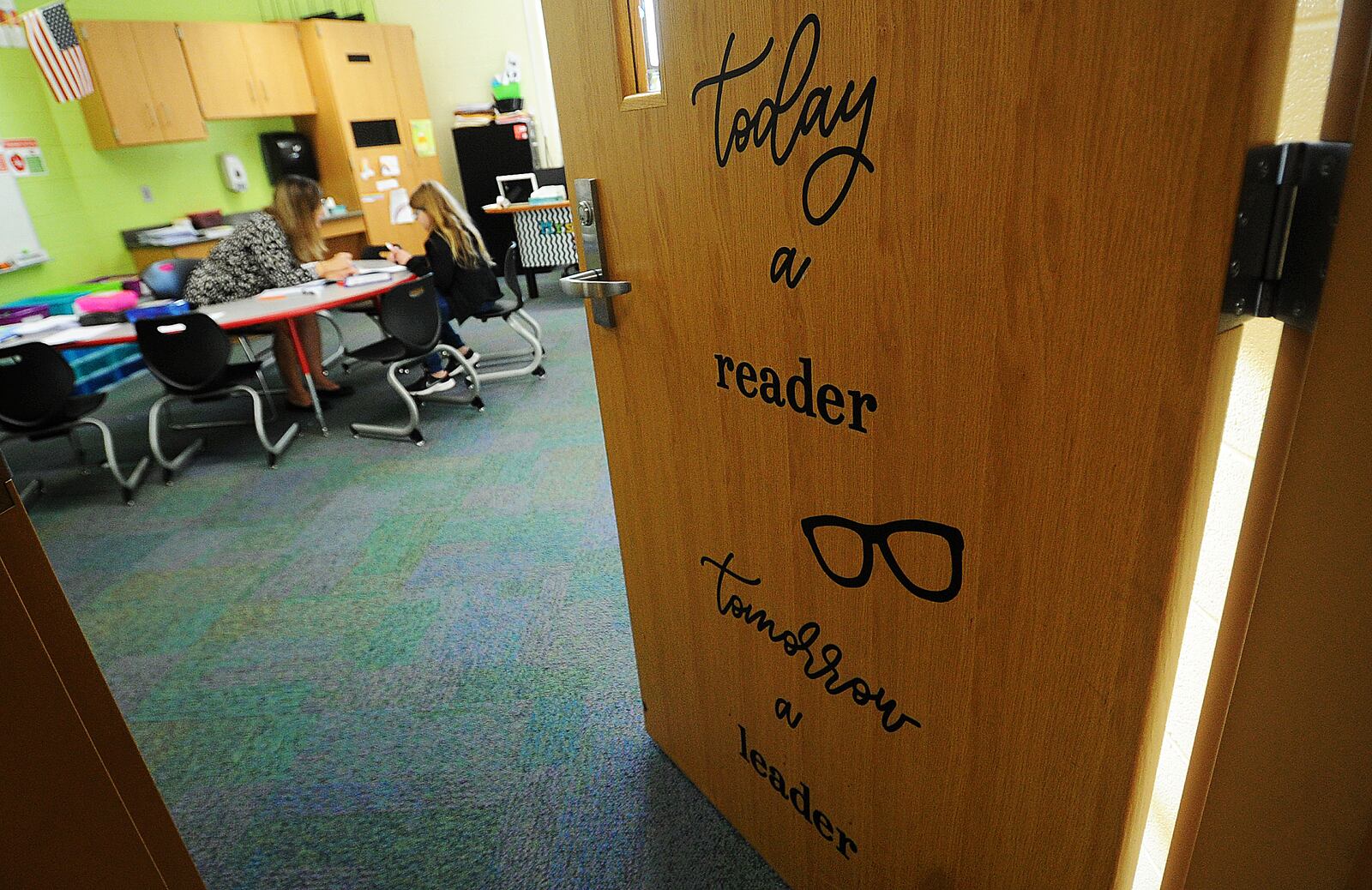 Inspringing words on reading on a classroom door at Charles Huber Elementary in Huber Heights. MARSHALL GORBY\STAFF