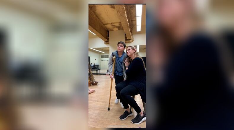 Aaron Exman (Aamhl Cover and Page Apprentice) and Rebecca Krynski Cox (Amahl's Mother) in rehearsal for Dayton Opera's production of "Amahl and the Night Visitors." CONTRIBUTED