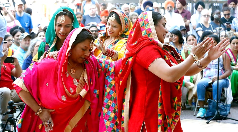 Members of the Sikh dance group Punjabi Bhangra perform a few years ago during CultureFest. BILL LACKEY/STAFF