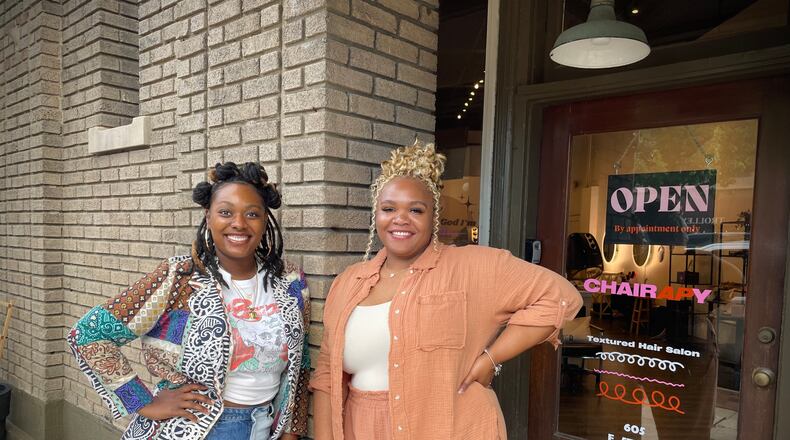 Chairapy, a textured hair salon, is located at 605 E. Fifth St. in Dayton's Oregon District. Pictured (left to right) is Salon Manager Morgan Scott and Owner Asha Parson. NATALIE JONES/STAFF
